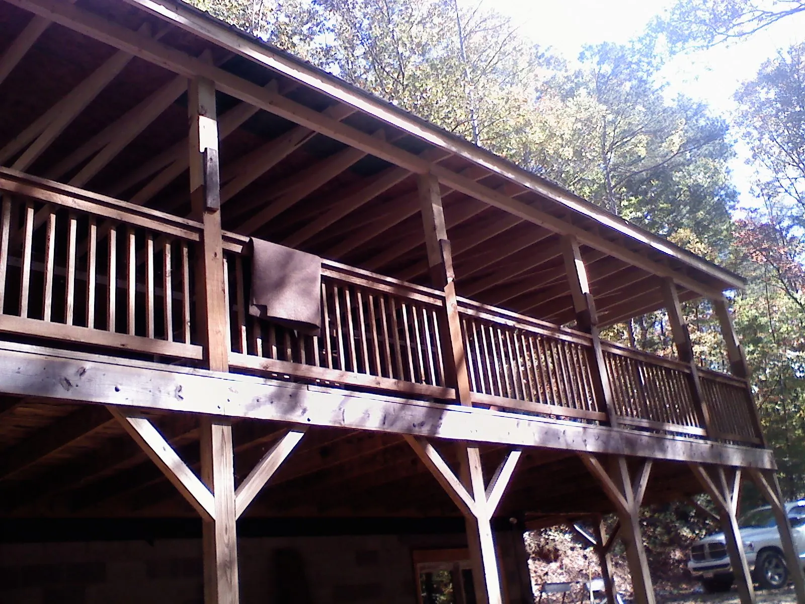 Timber framing under a new elevated porch and deck — Roof Leak Repair in Eure by Roofing Brothers